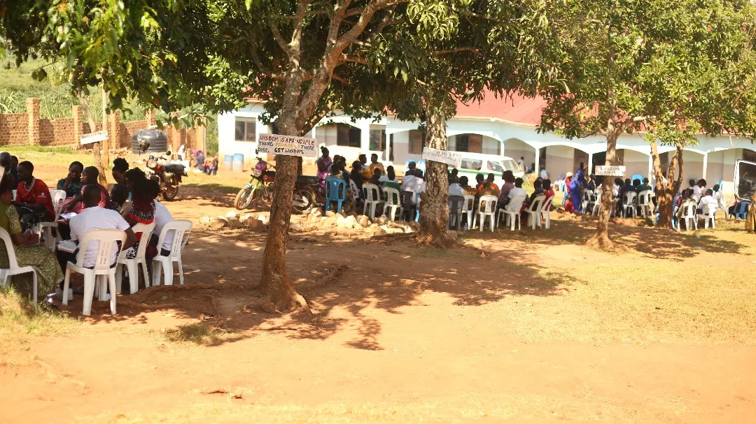 Members of the ministry working the ground together