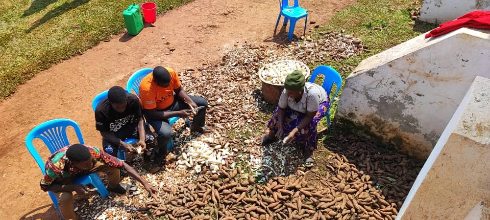 Members of the ministry working the ground together